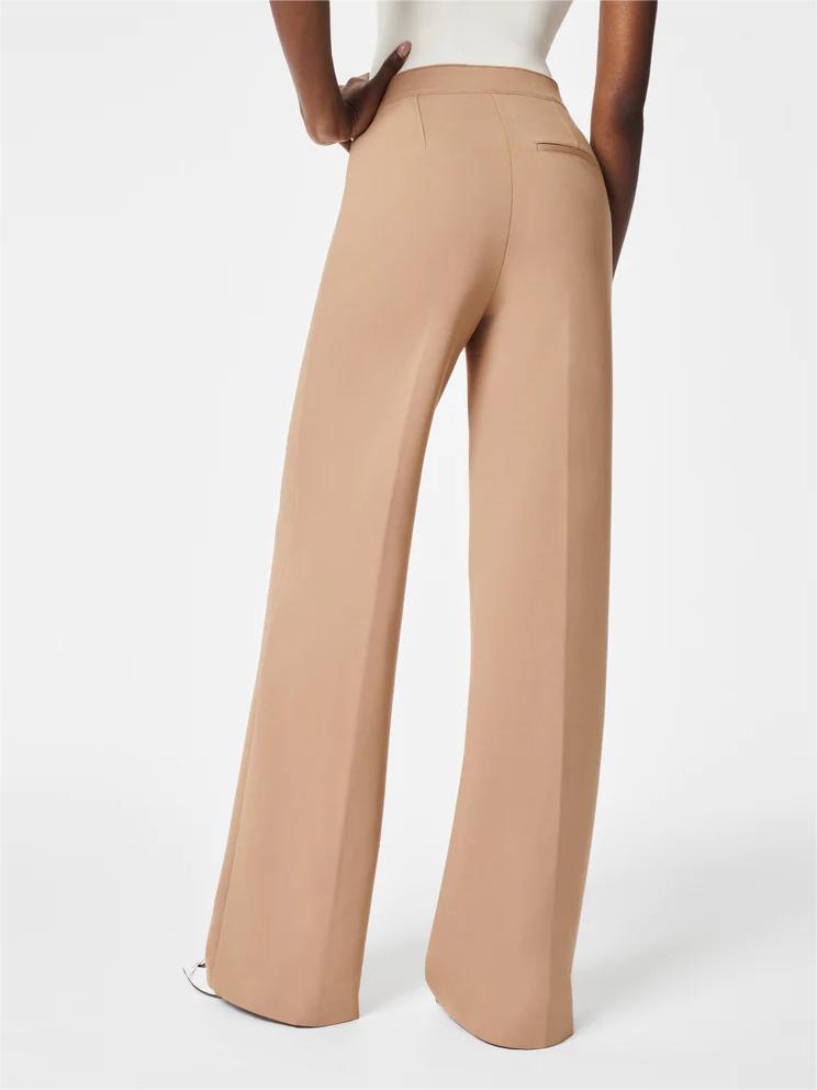 KnopfStil | Weit geschnittene Hose mit hoher Taille und Zierknöpfen